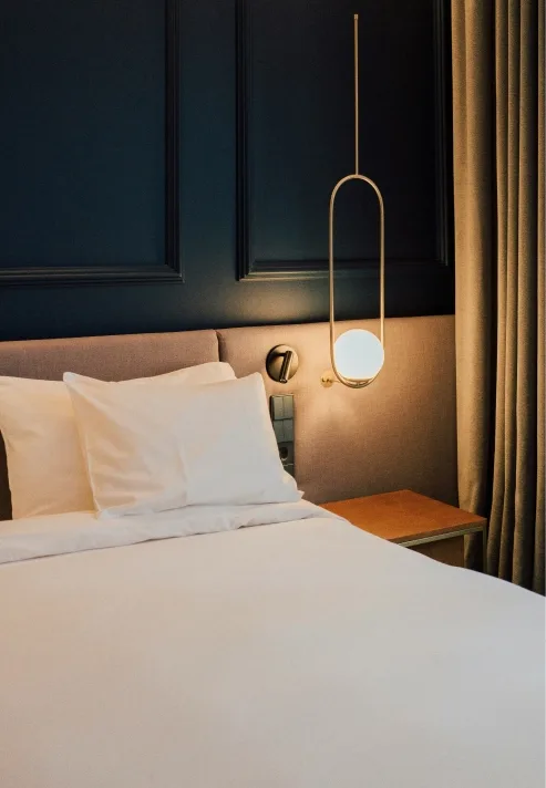 A warmly lit hotel room